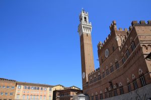 Torre del Mangia in the Piazza del Campo in Siena, Italy. A lovely stop on any road trip.